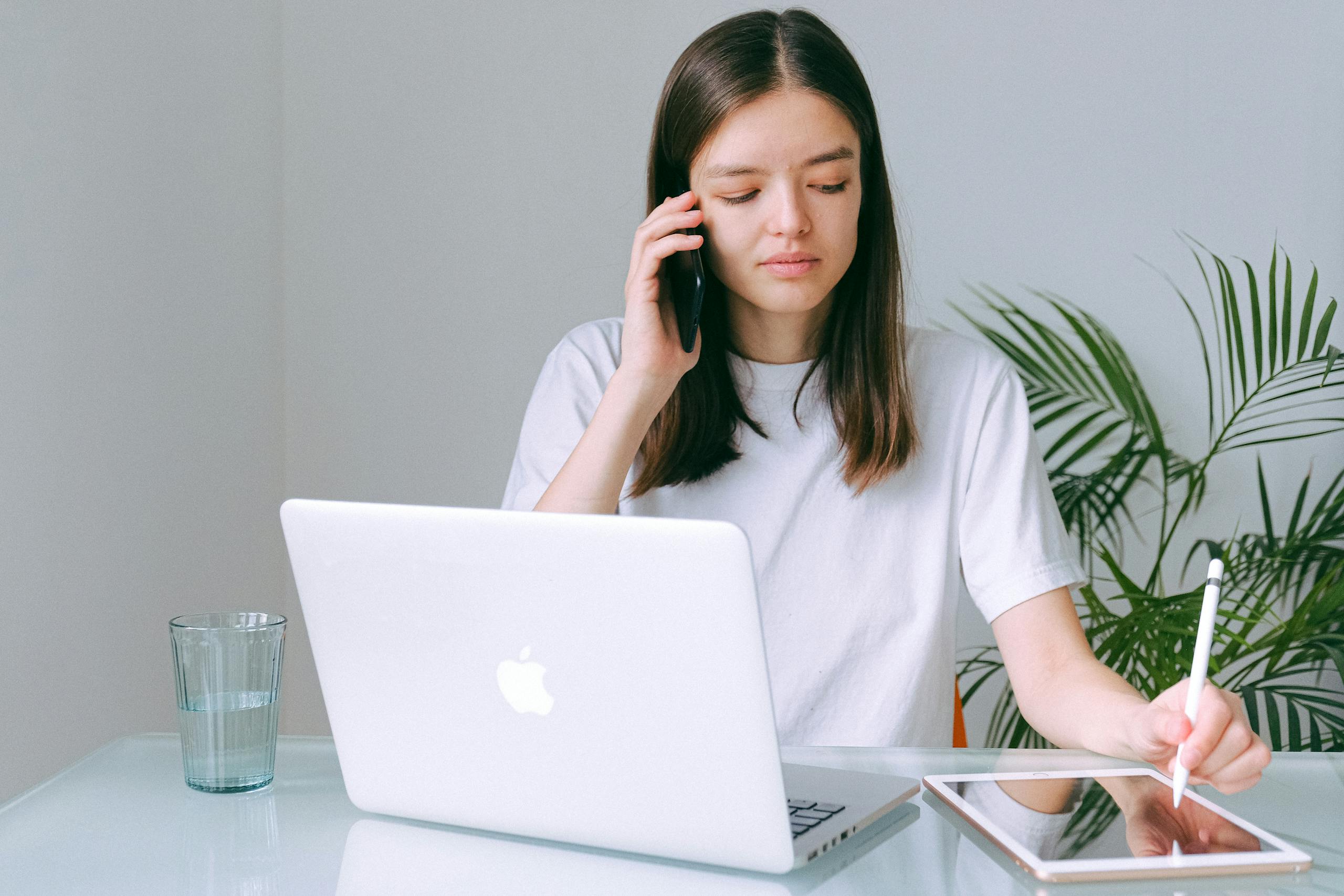 recruiter scanning LinkedIn profiles on laptop